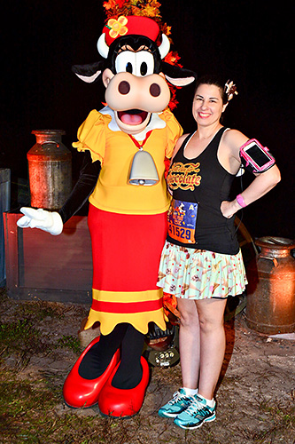 Meeting Clarabelle Cow at rundisney Wine and Dine Half Marathon 5k at Disney World