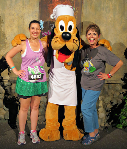 Meeting Pluto at Disney World during rundisney Wine and Dine Half Marathon