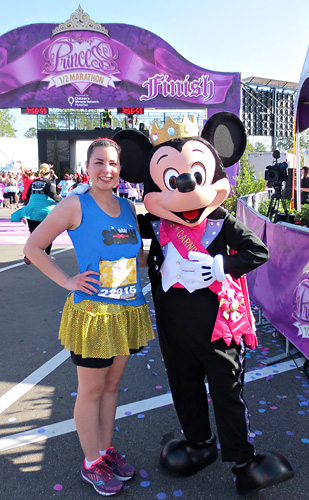 Meeting Mickey Mouse at Disney World at rundisney princess half marathon