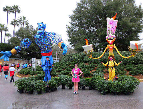 Meeting Genie and Lumiere World of Color Puppet at Disney World during rundisney Half Marathon 10k