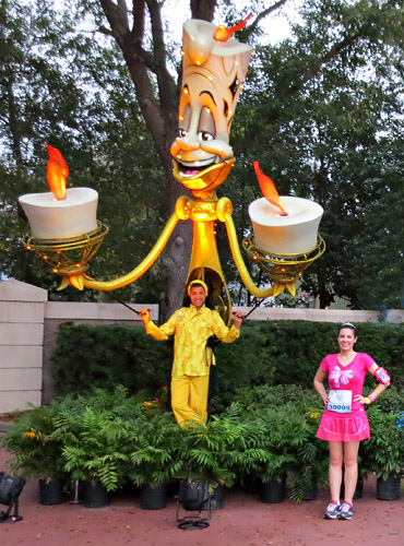 Meeting Lumiere World of Color Puppet at Disney World during rundisney princess Half Marathon 10k